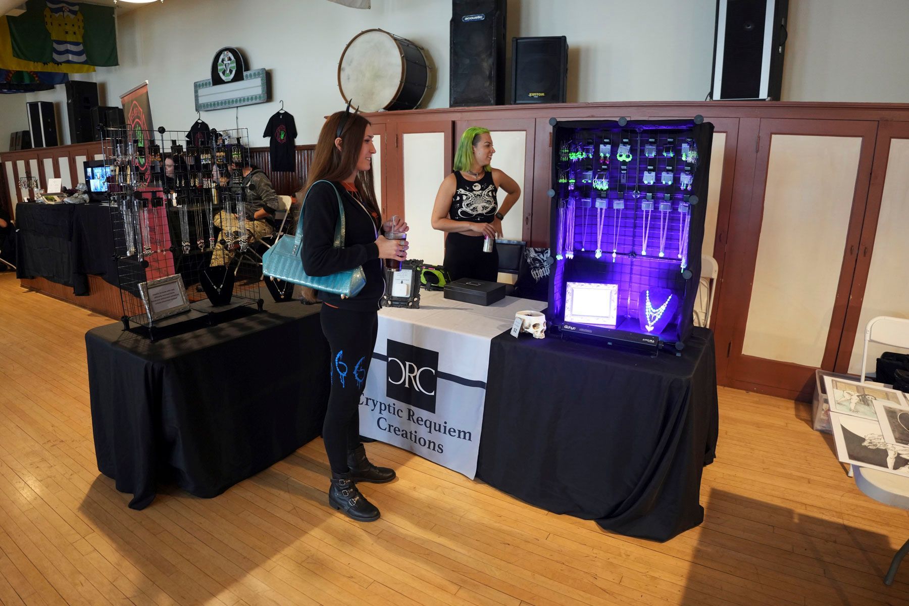 A woman standing in front of a table that has the word blitz on it