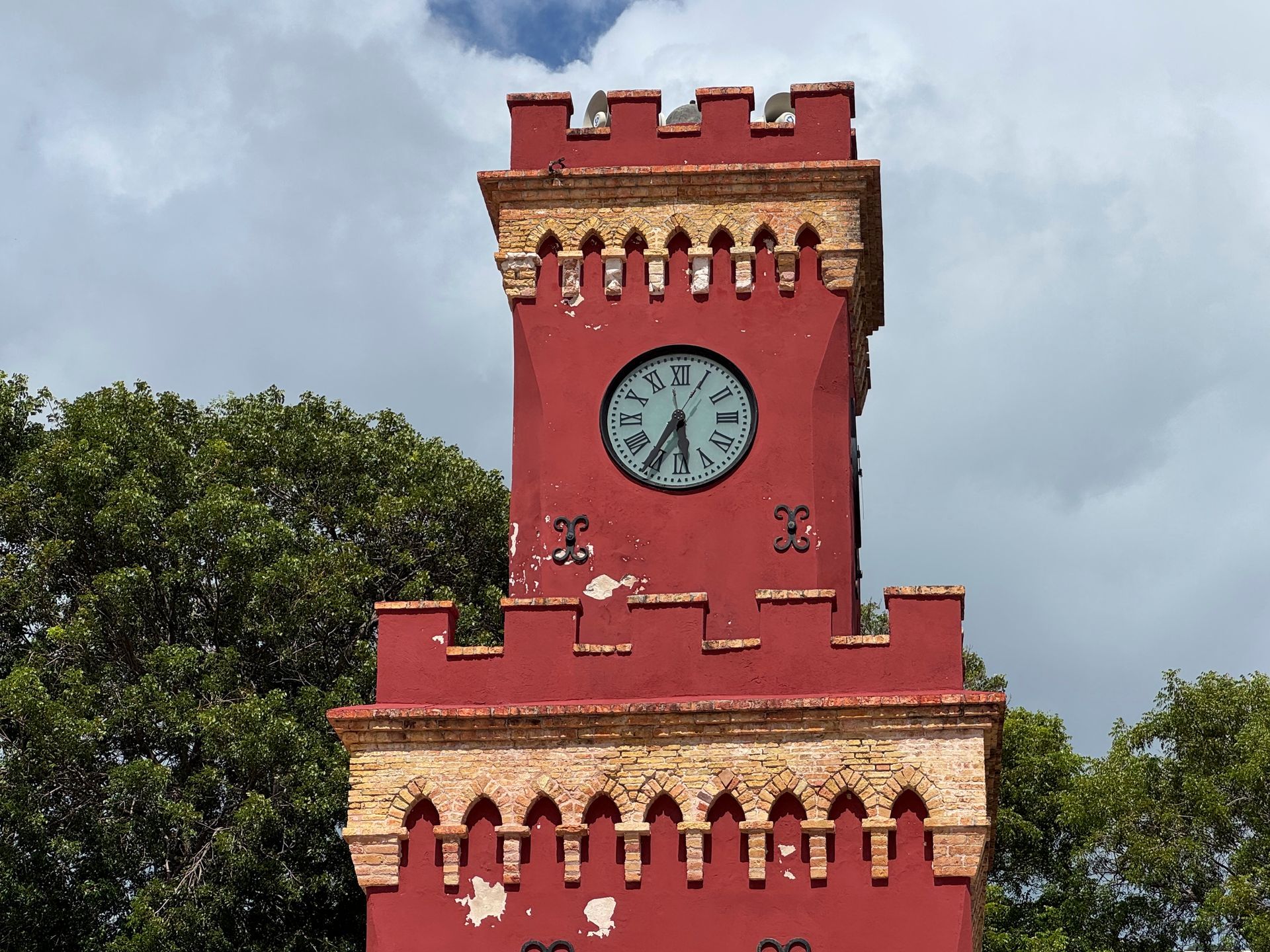 An old red clock tower at Fort Christian USVI