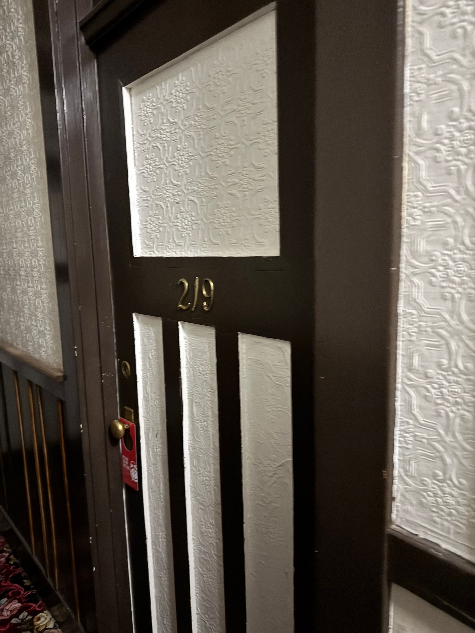 Room 219 at the haunted Alaskan Hotel and Bar with a Do Not Disturb sign