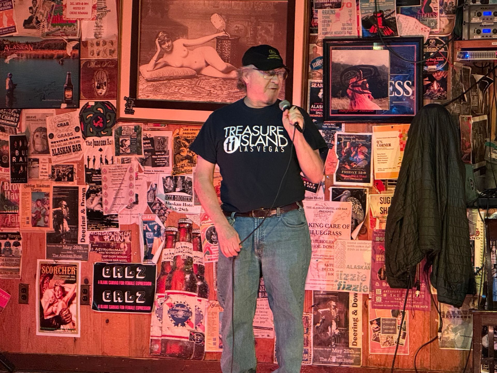 Steve singing karaoke at the Alaskan Hotel and Bar stage