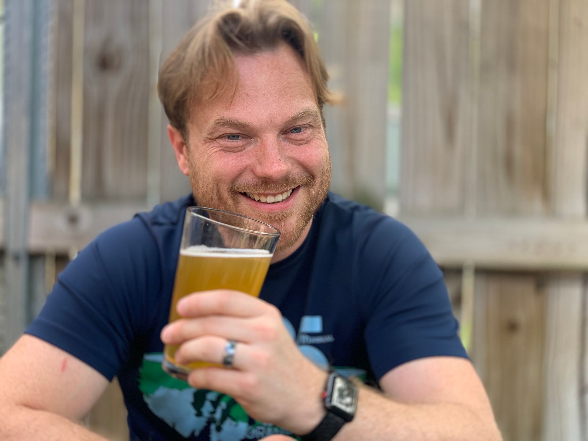 Mike Huberty drinking a cold beer at haunted Mickey's Tavern in Madison, Wisconsin