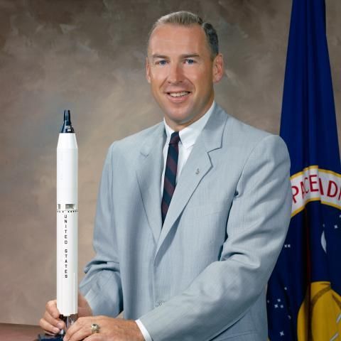 Jim Lovell with a rocket
