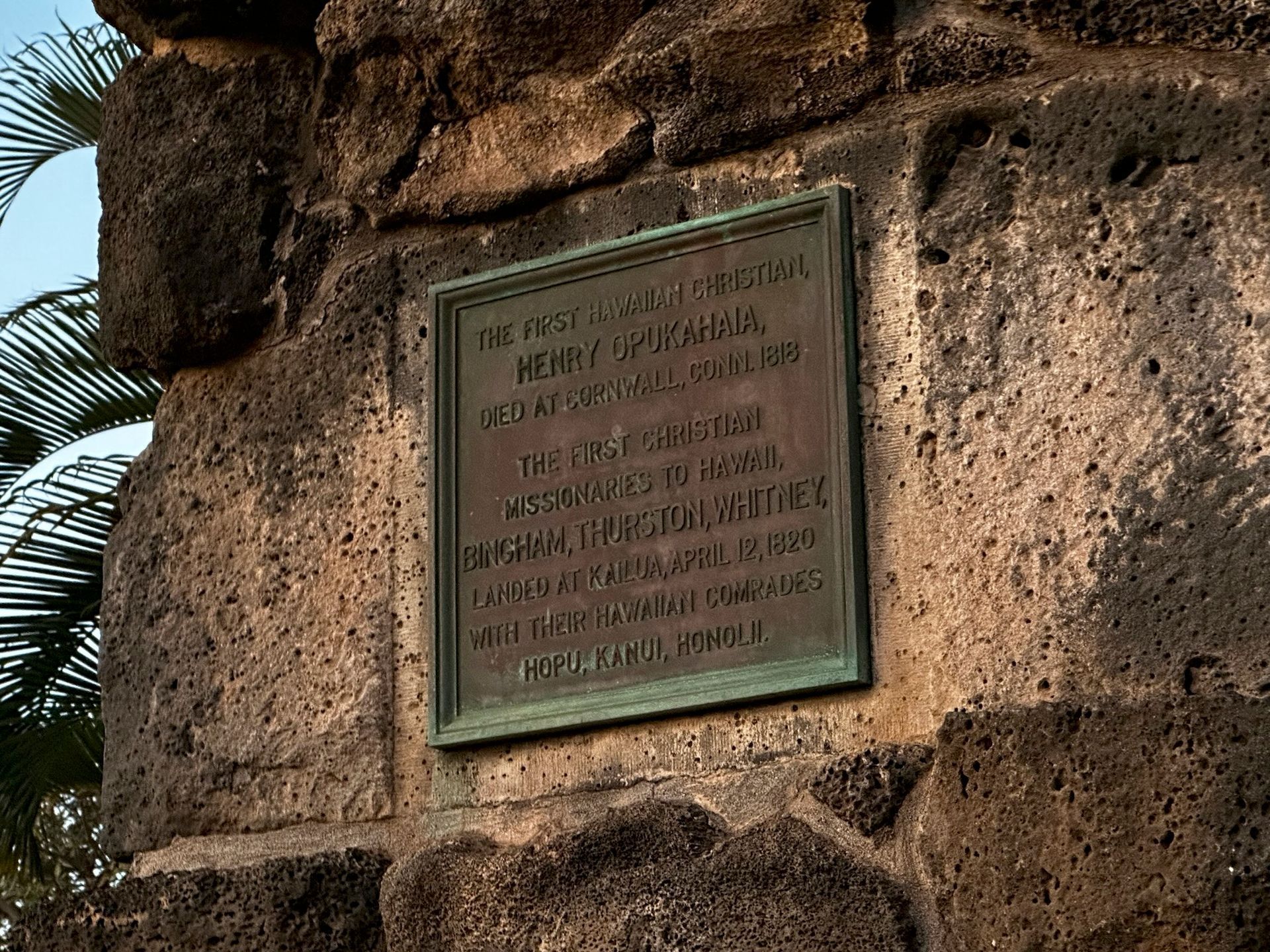 A plaque on a stone wall says that it was built in 1862