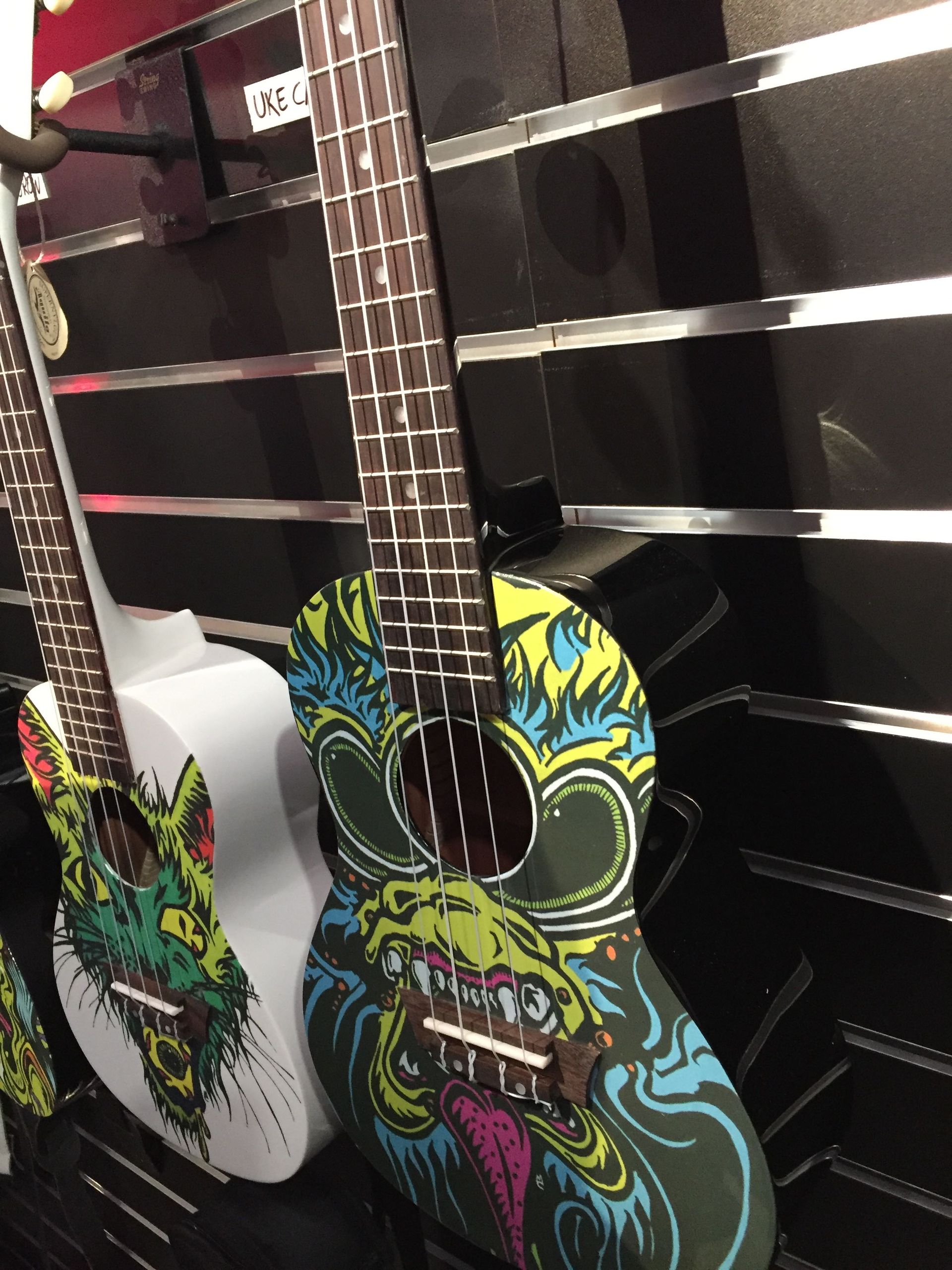A guitar with a colorful design on it