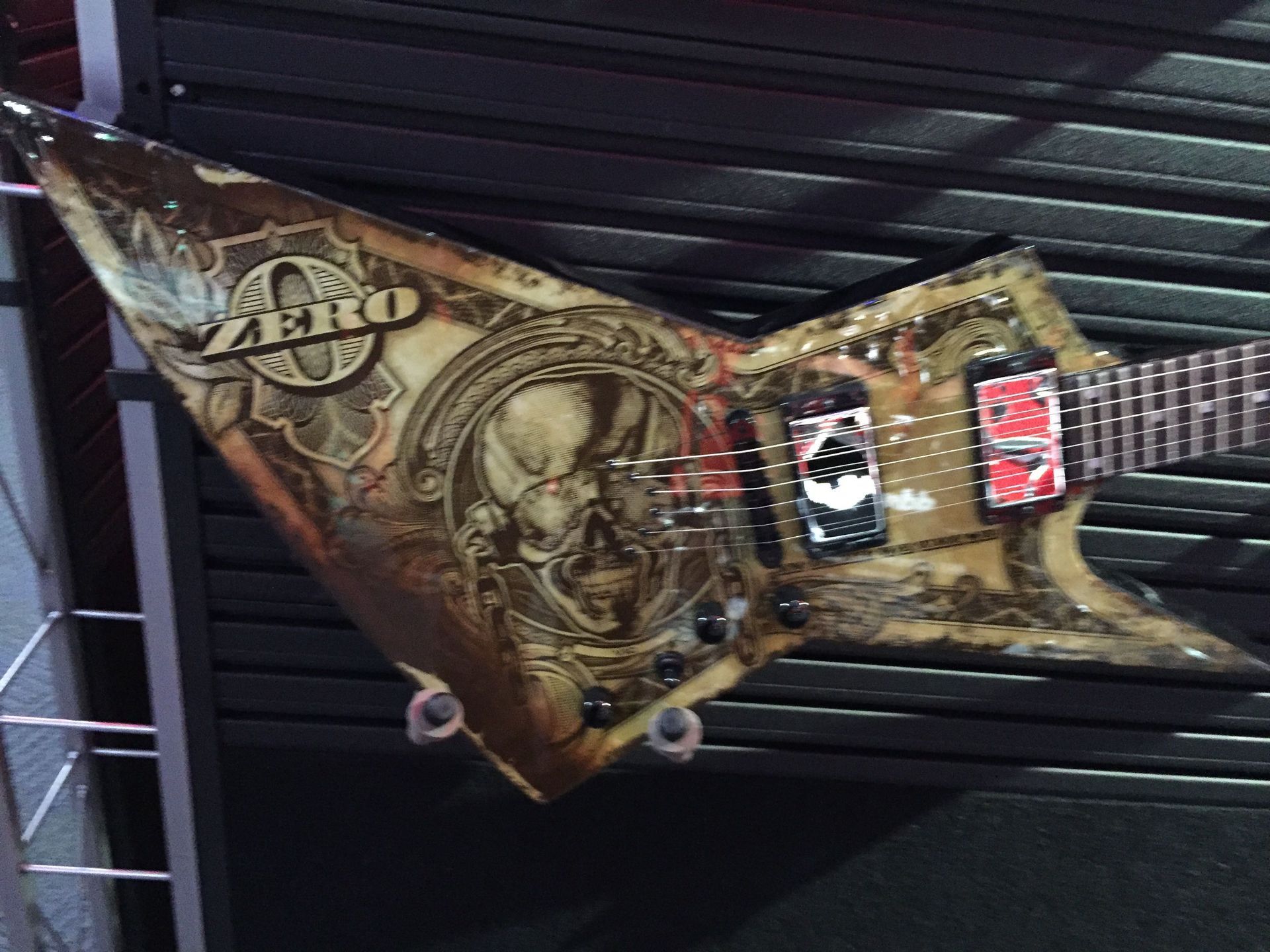 A guitar with the word zero on it