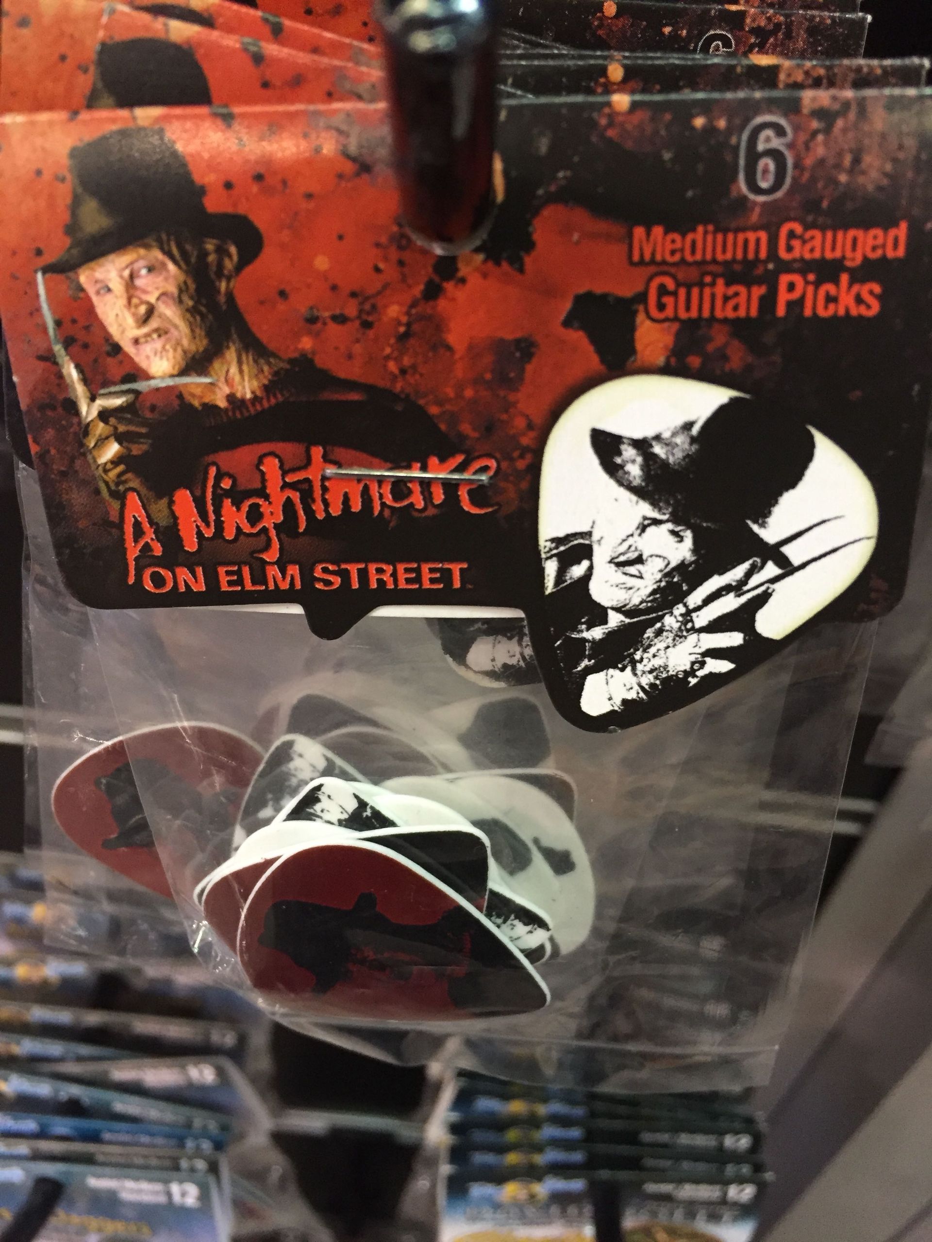 A package of a nightmare on elm street guitar picks