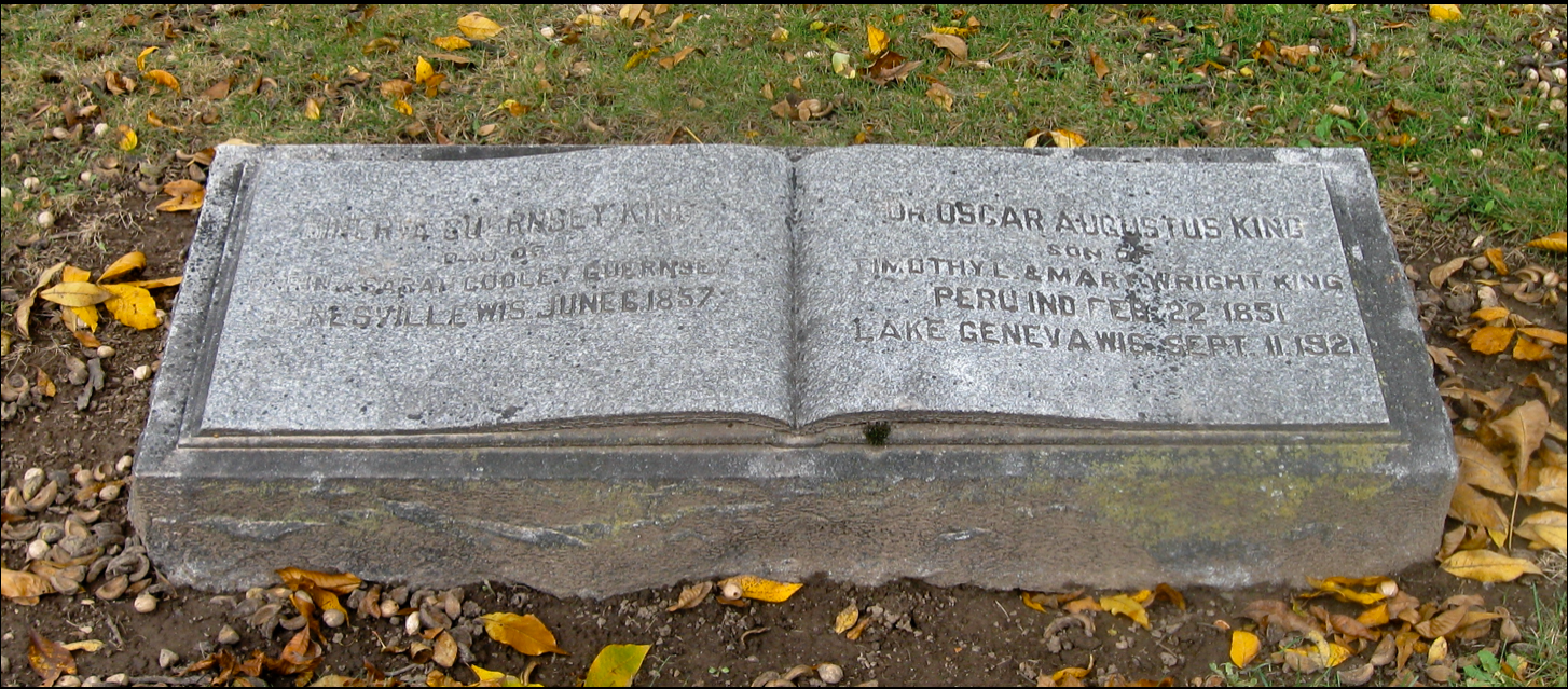 A gravestone in the shape of an open book