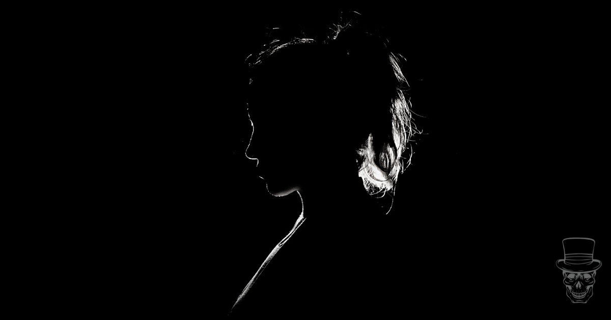 a shadow of a woman's silhouette