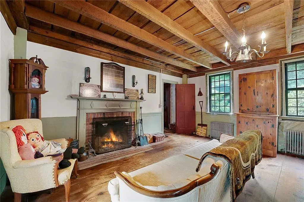 The Conjuring House Interior Sitting Room photo with Annabelle and Ouija Board