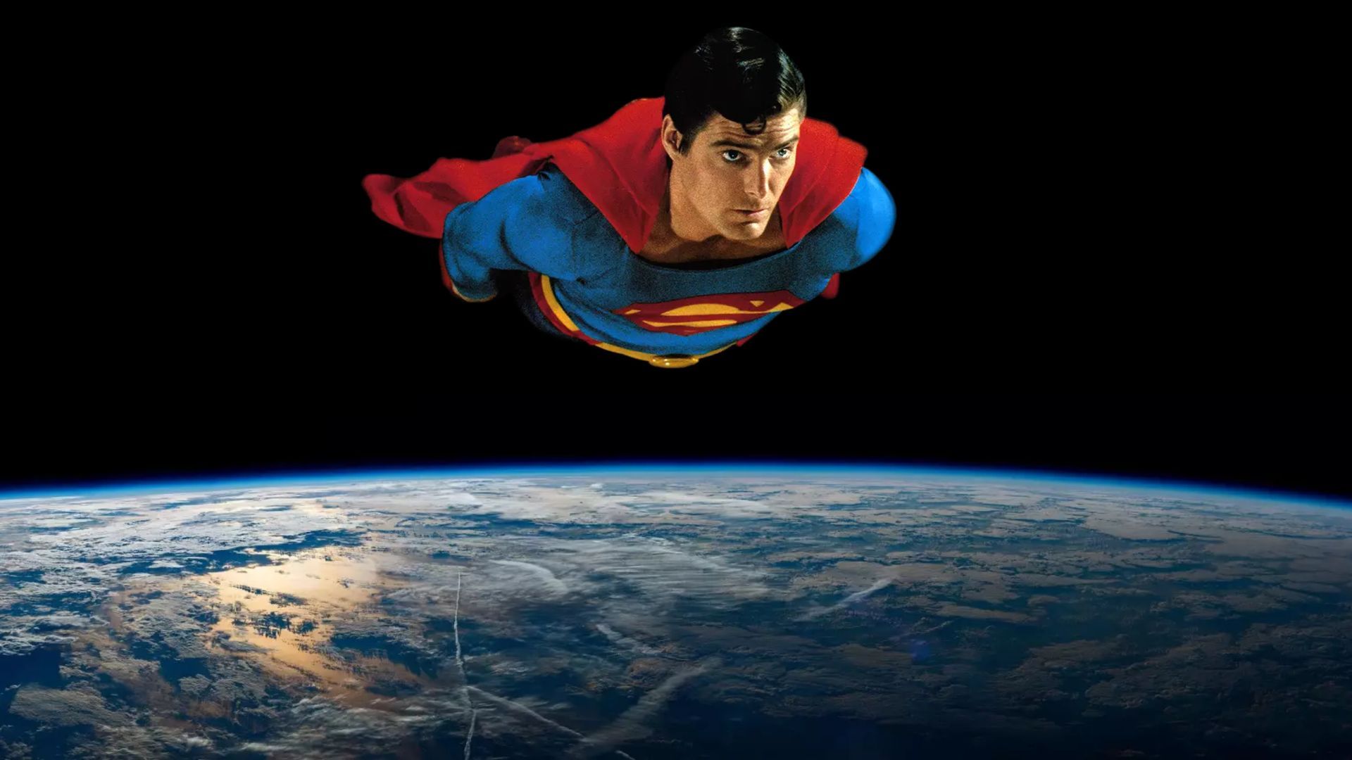 Christopher Reeves flying over Earth as Superman
