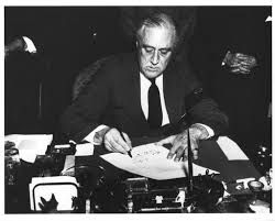 FDR signing the war declaration on Japan