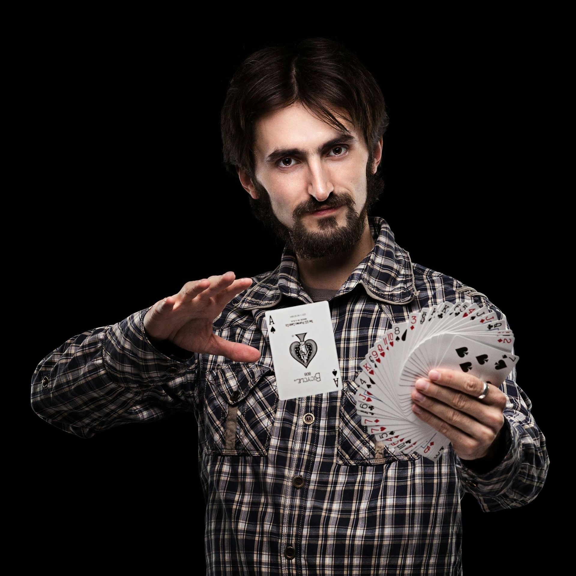 Magician with a deck of cards