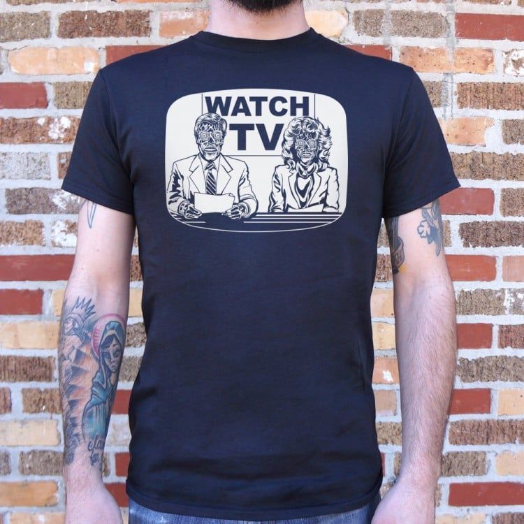 A man is wearing a t-shirt that says watch tv