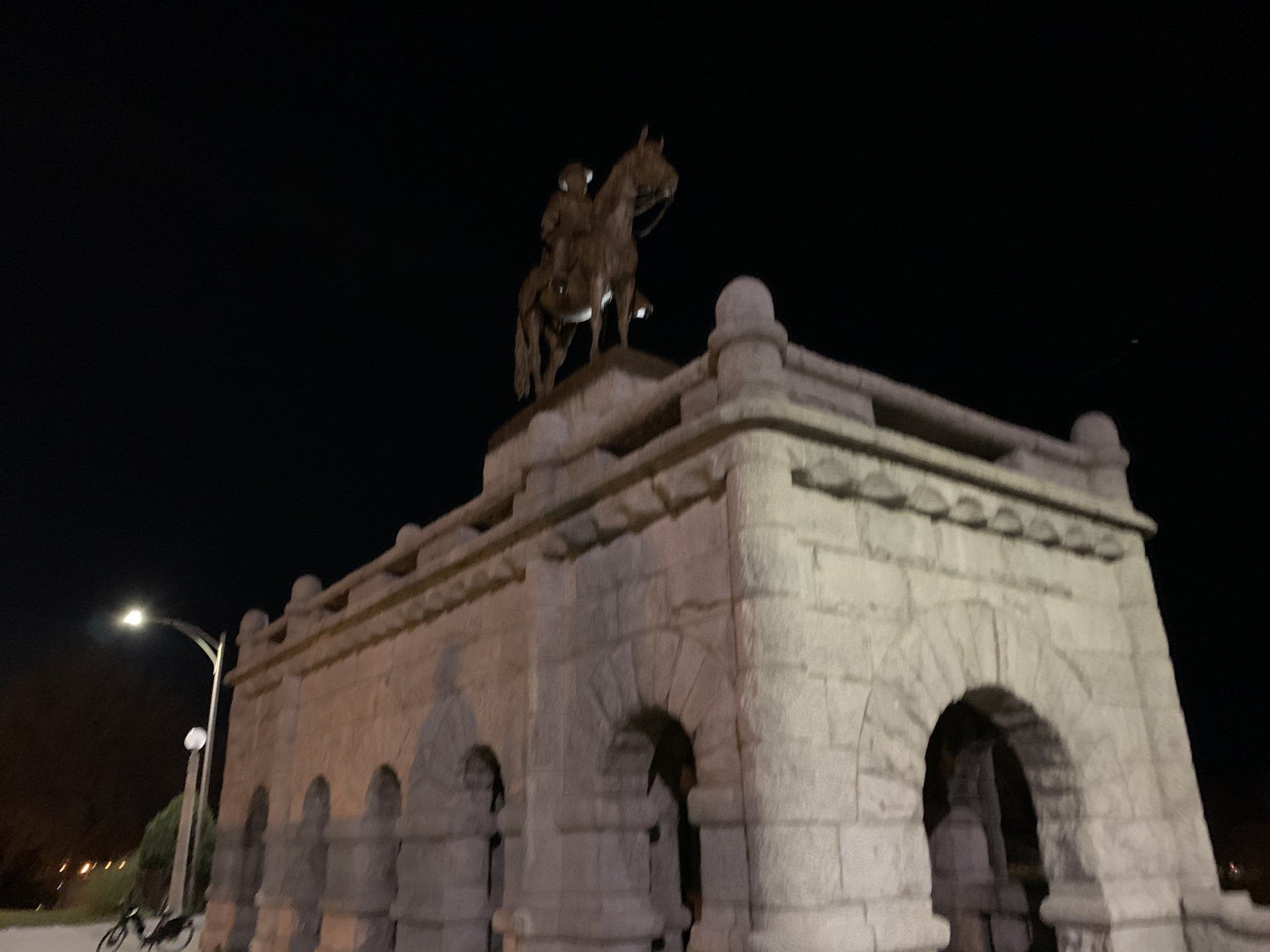 Statue of Man Riding a Horse