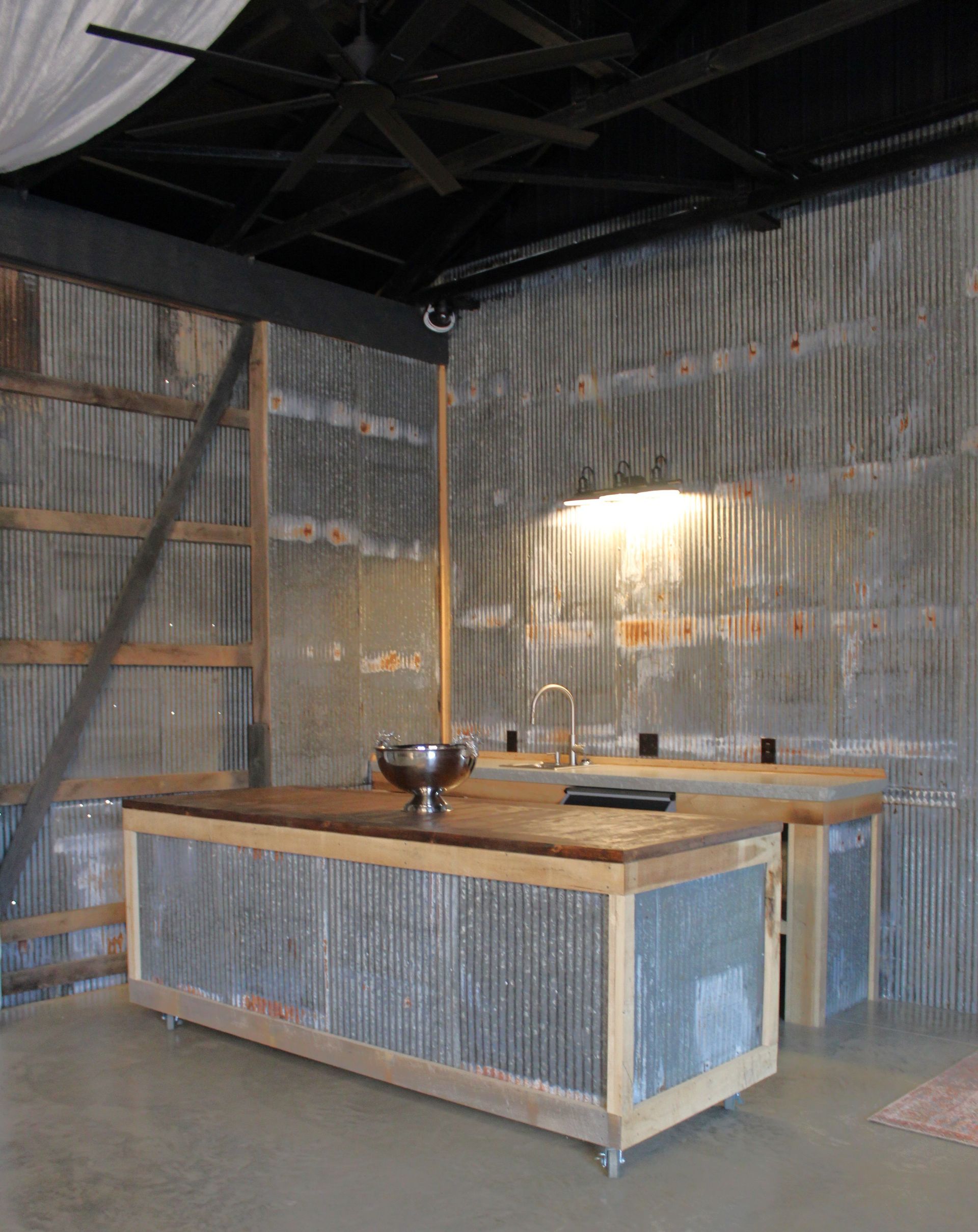 Full wet bar with ice machine and a rolling island for convenience.