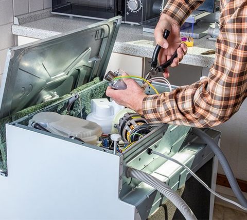 Works on Broken Dishwasher in a Kitchen — Coral Springs, FL — Air Conditing & Appliances by Jim
