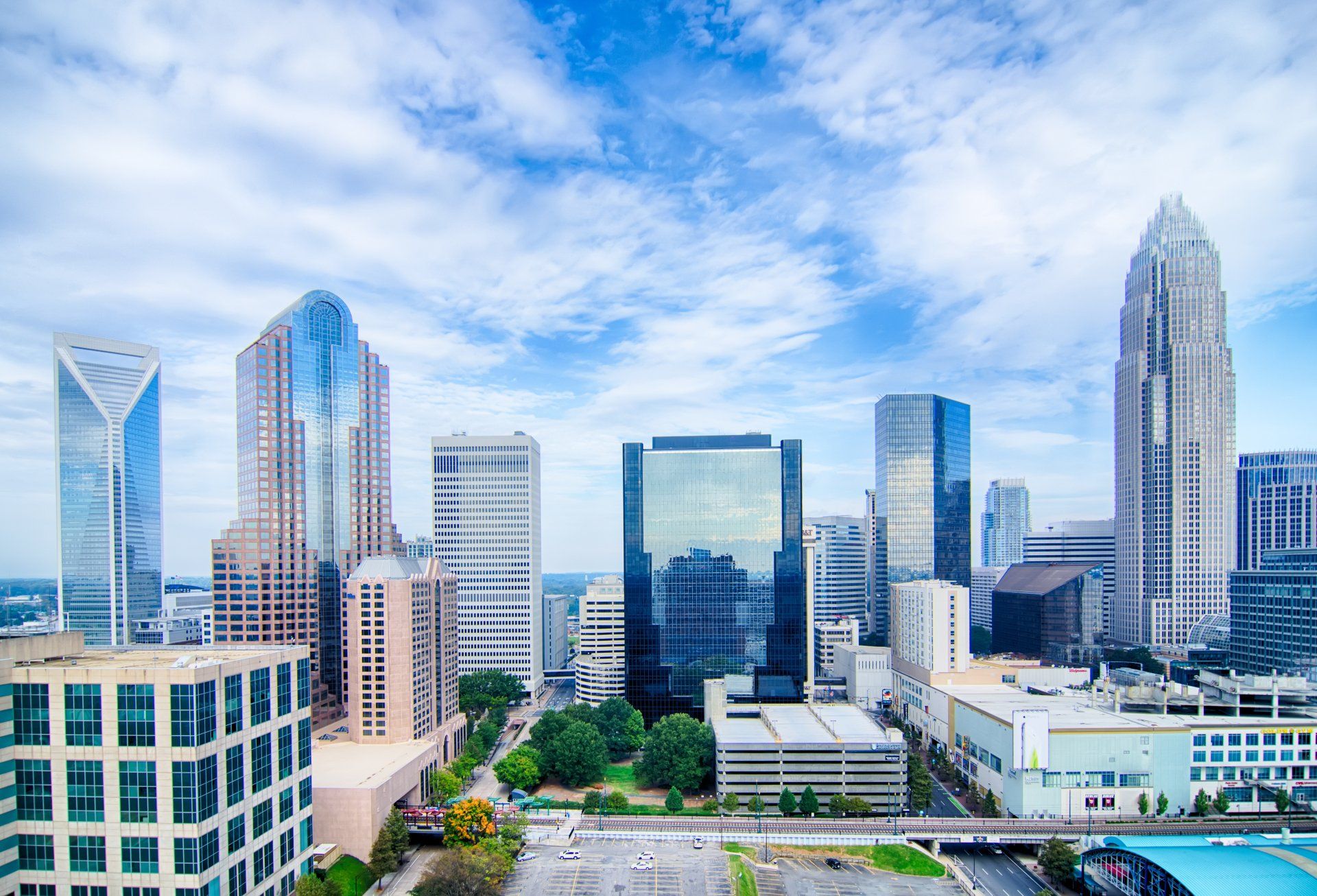 An aerial view of a city skyline on a cloudy day.