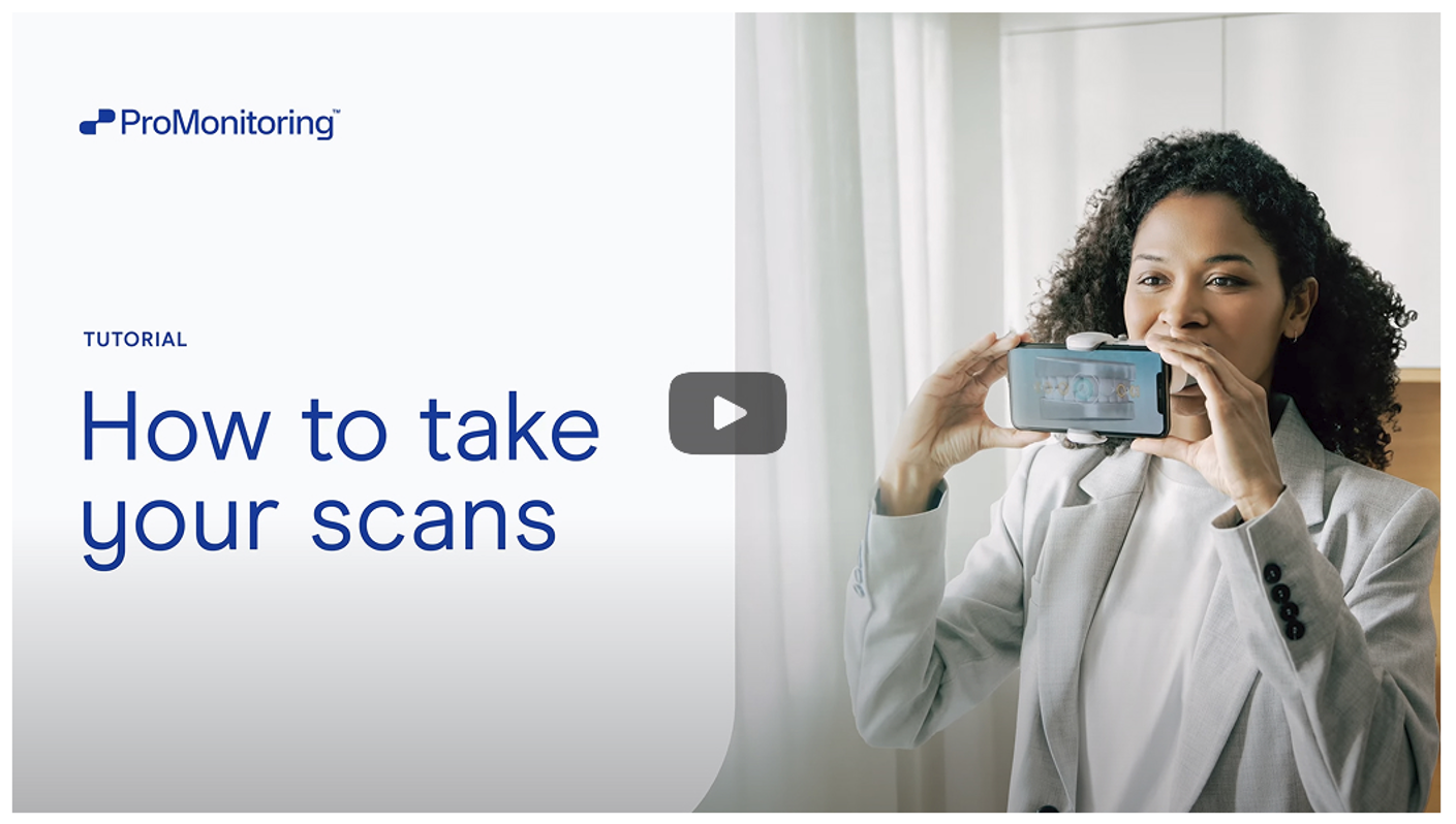 A woman is taking a picture of herself with a cell phone.