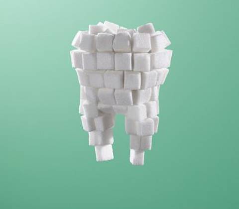 Dente fatto di zollette di zucchero
