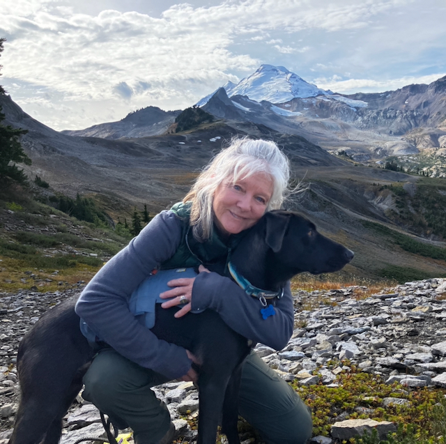 Elizabeth Anne Johnson with her dog Pretzel near Mt. Baker,  WA