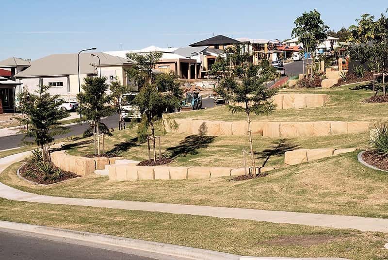 A Residential Area With Lots of Houses and Trees — Australian Rock Walls In Burleigh Heads, QLD