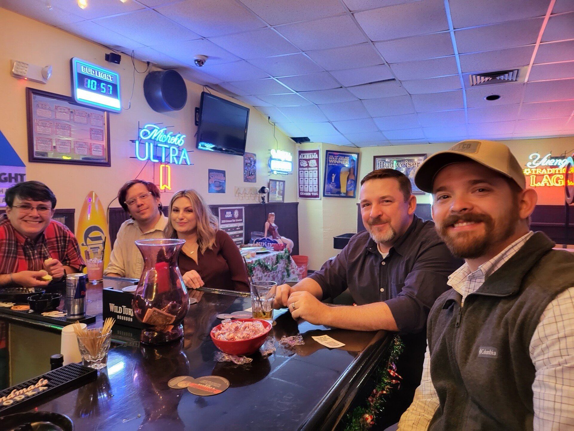 A Group Of People  Smiling While Taking Picture | Foley, AL | The Office Lounge
