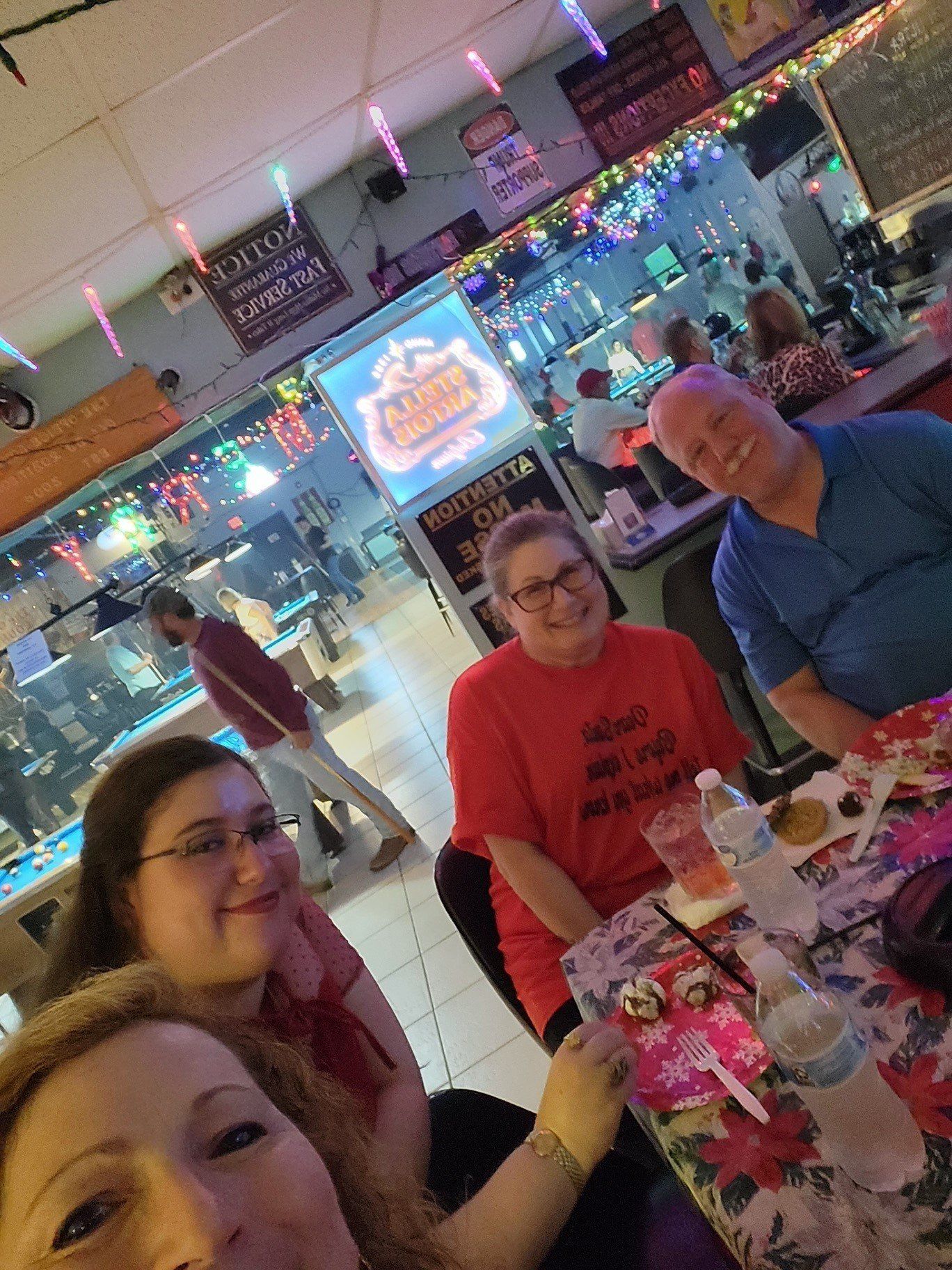 A Group Of People Taking Picture At The Bar | Foley, AL | The Office Lounge