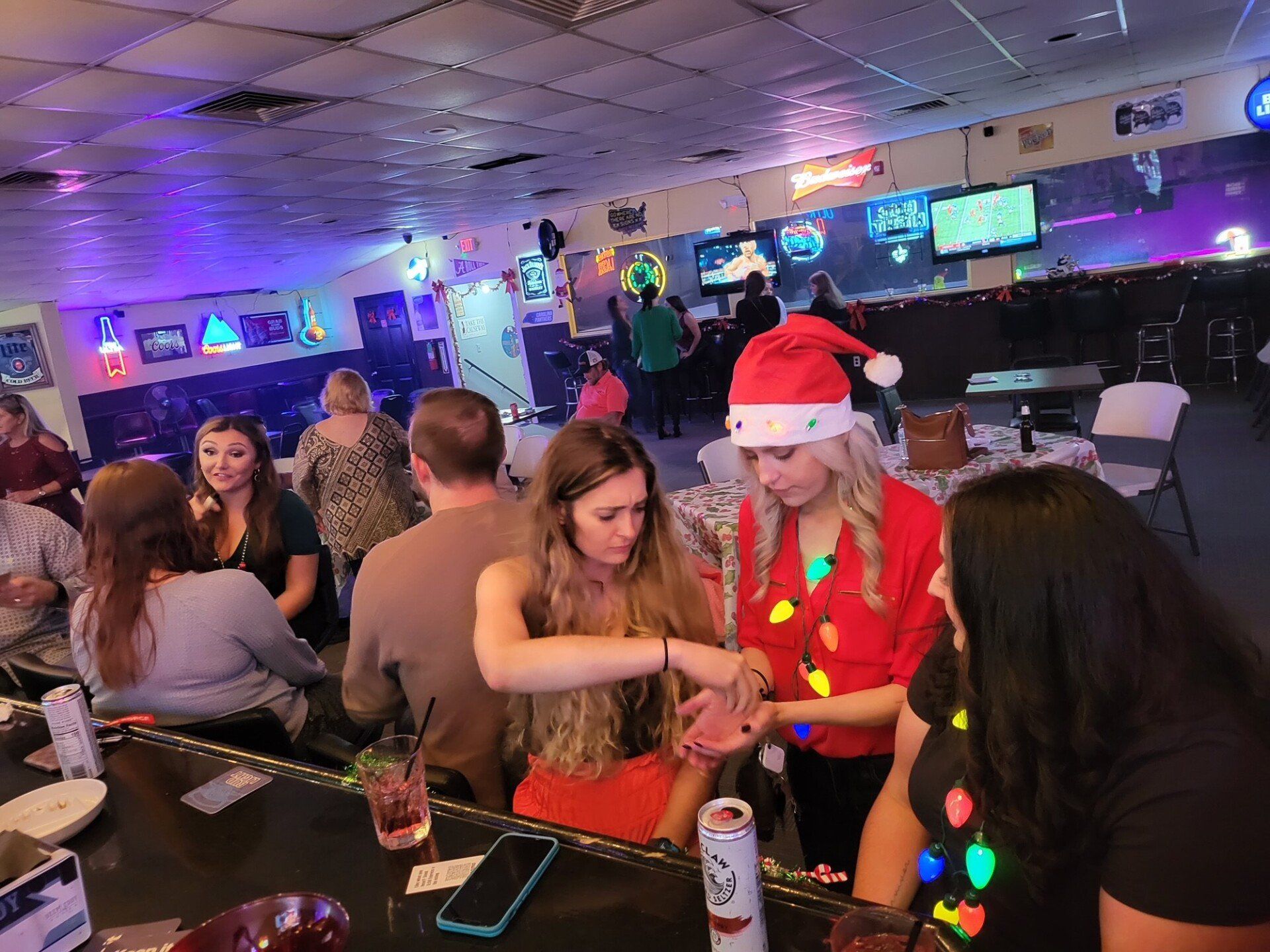 A Group Of People Talking At The Bar | Foley, AL | The Office Lounge