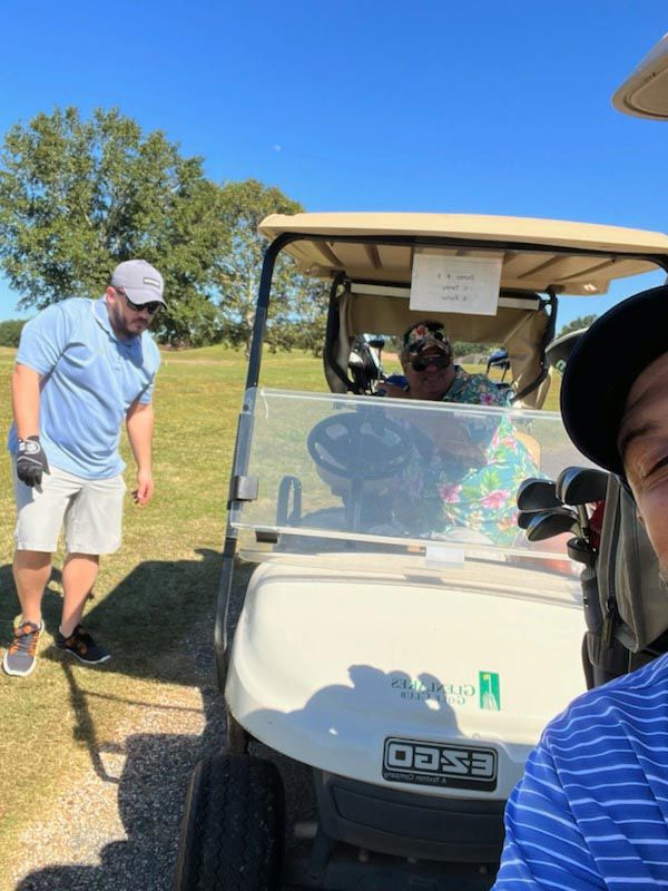 Group of Men on Golf Course with Golf Cart | Foley, AL | The Office Lounge