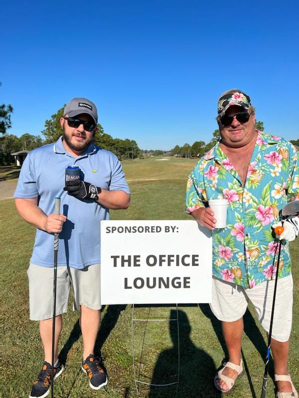 Two Golfers with The Office Lounge Signage | Foley, AL | The Office Lounge