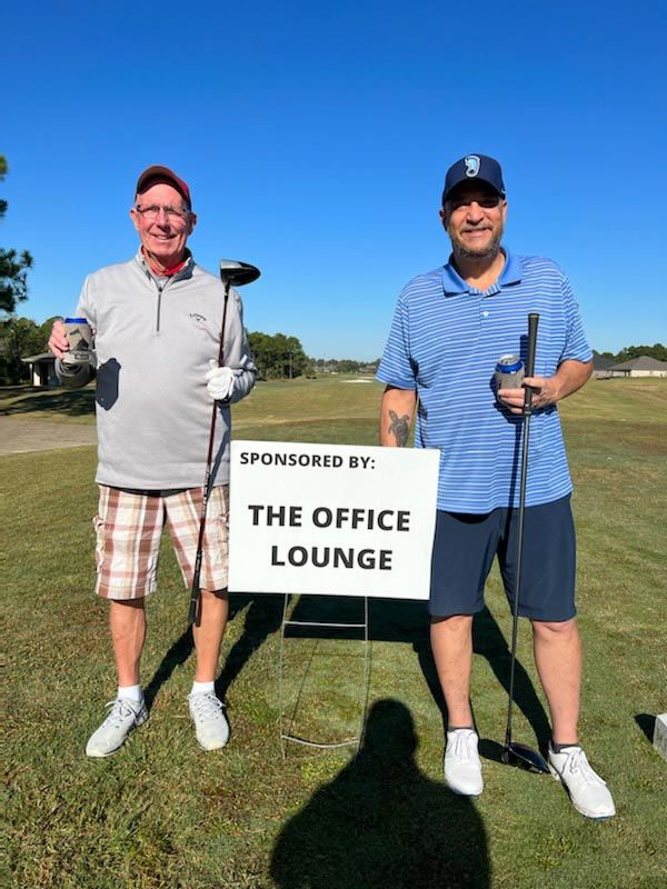 Two Golfers Holding Golf Club | Foley, AL | The Office Lounge