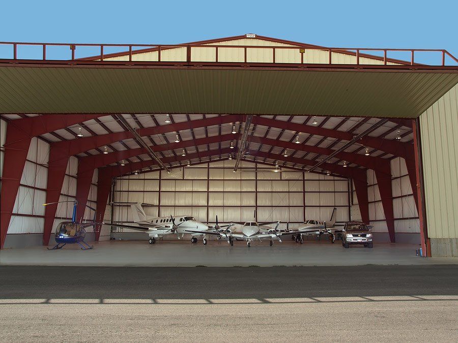 Plane, Car and Helicopter in a Hangar — Jacksonville, FL — Assign Commercial Group