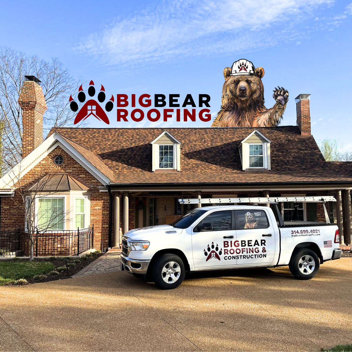 Big Bear Roofing truck parked in front of a house with the company logo, featuring a bear in a hard hat on the roof.
