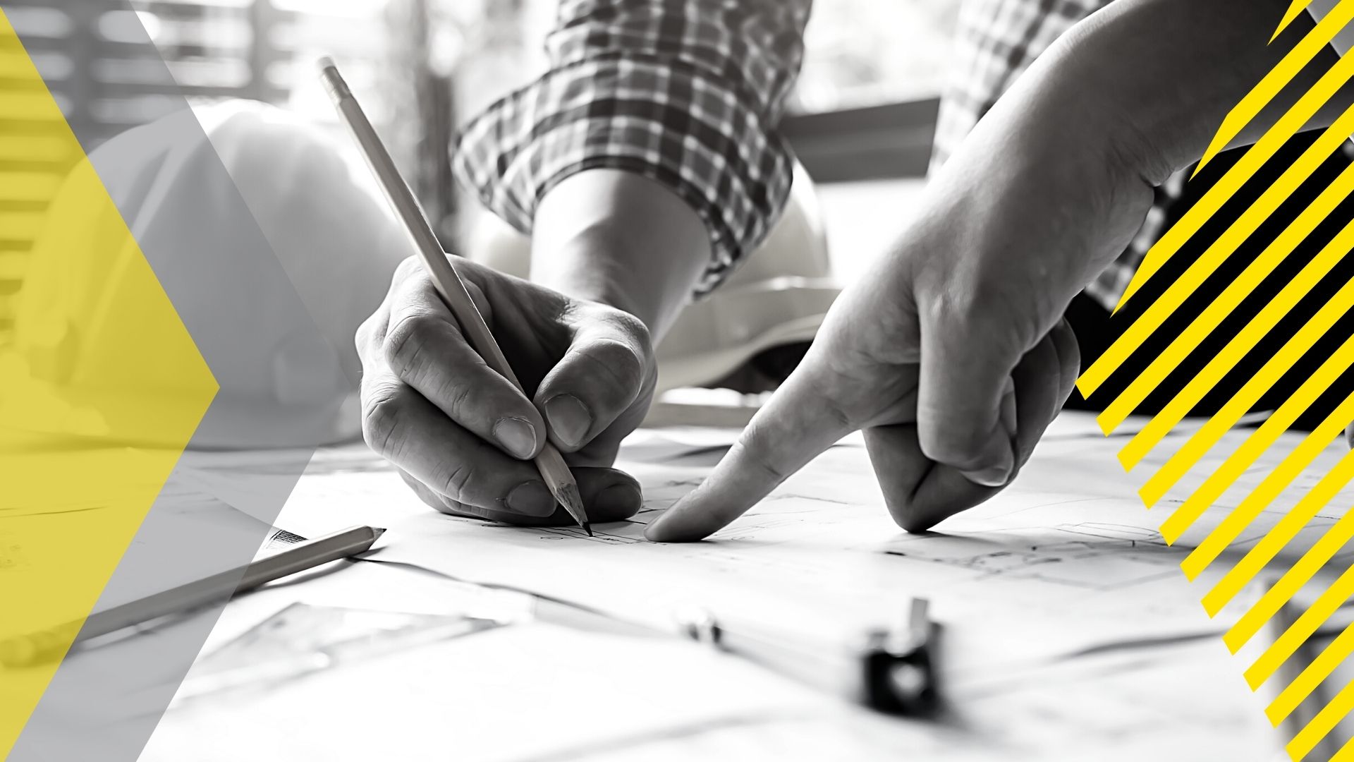 A person is drawing on a piece of paper with a pencil.