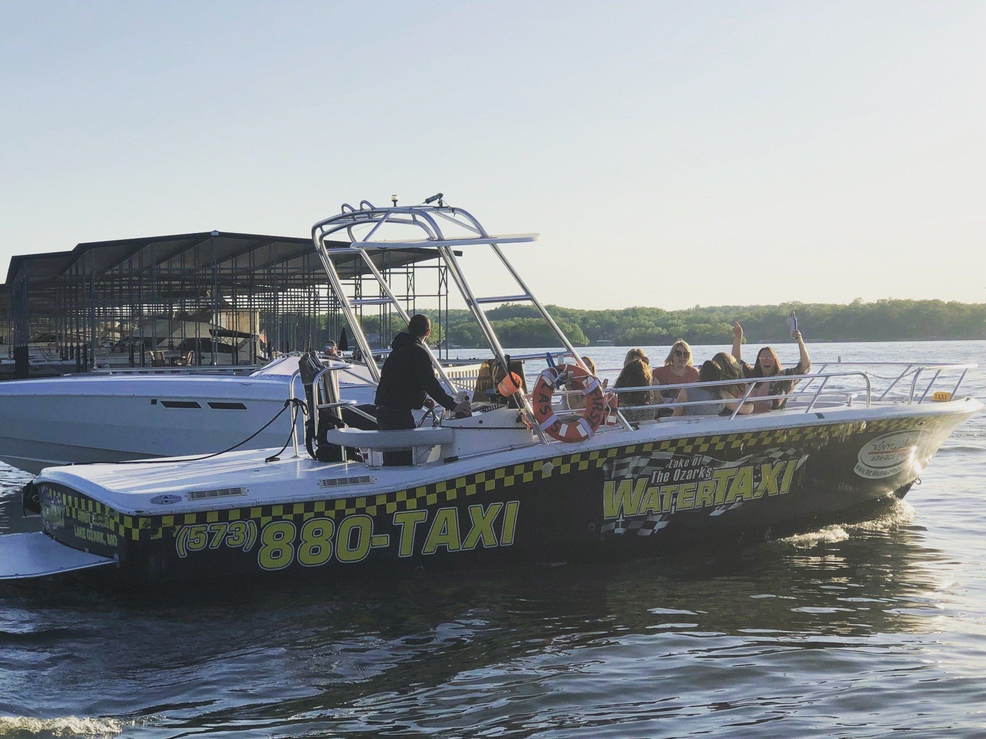 Lake of the Ozarks Water Taxi boat carrying bachelorette party at Lake of the Ozarks