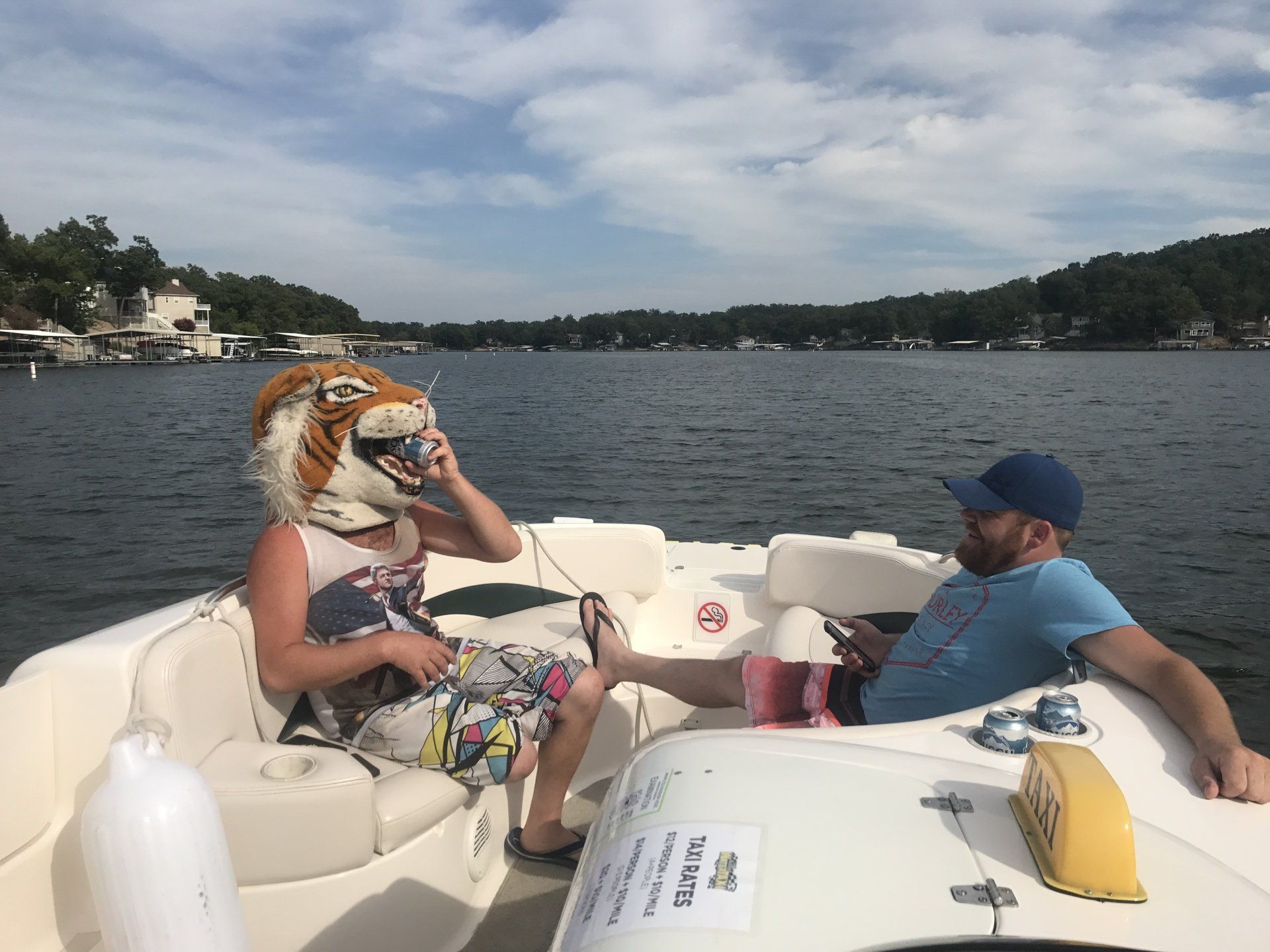 guys on water taxi one wearing Mizzou tiger head