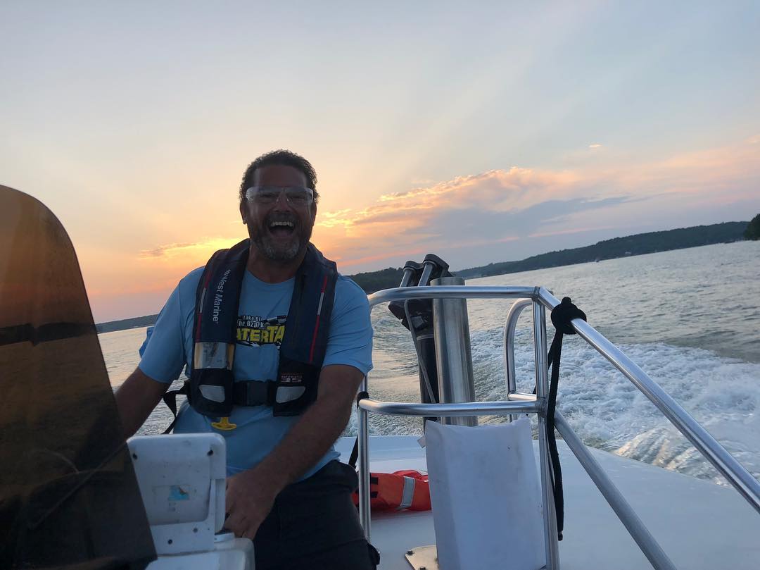 USCG licensed master captain Sean driving USCG certified 13 passenger Lake of the Ozarks Water Taxi boat