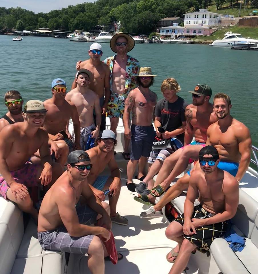 bachelor party guys posing on USCG certified boat taxi at Lake of the Ozarks