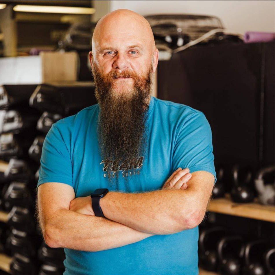 a confident Brazilian Jiu Jitsu instructor