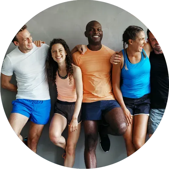 A group of people posing for a picture in a circle