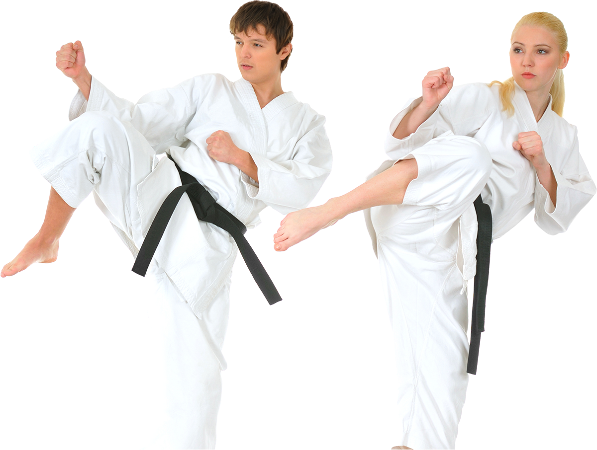 a boy and a girl are practicing karate with black belts