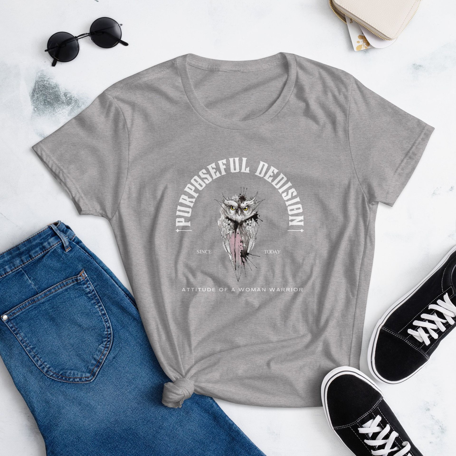 A grey t-shirt that says purposeful decision on it