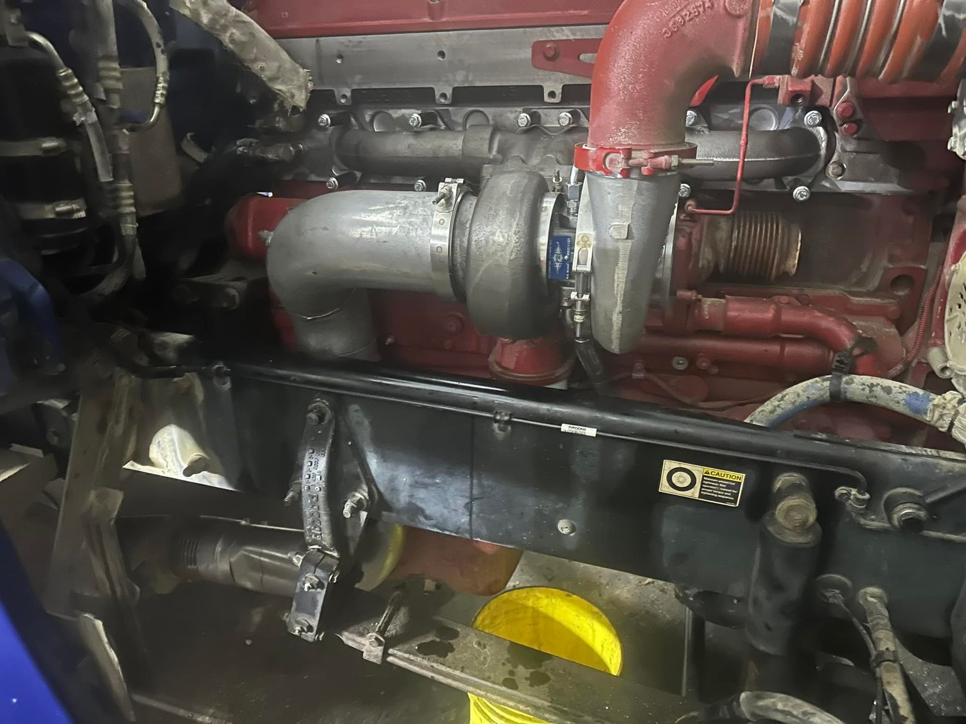 A close up of a truck engine with a turbocharger