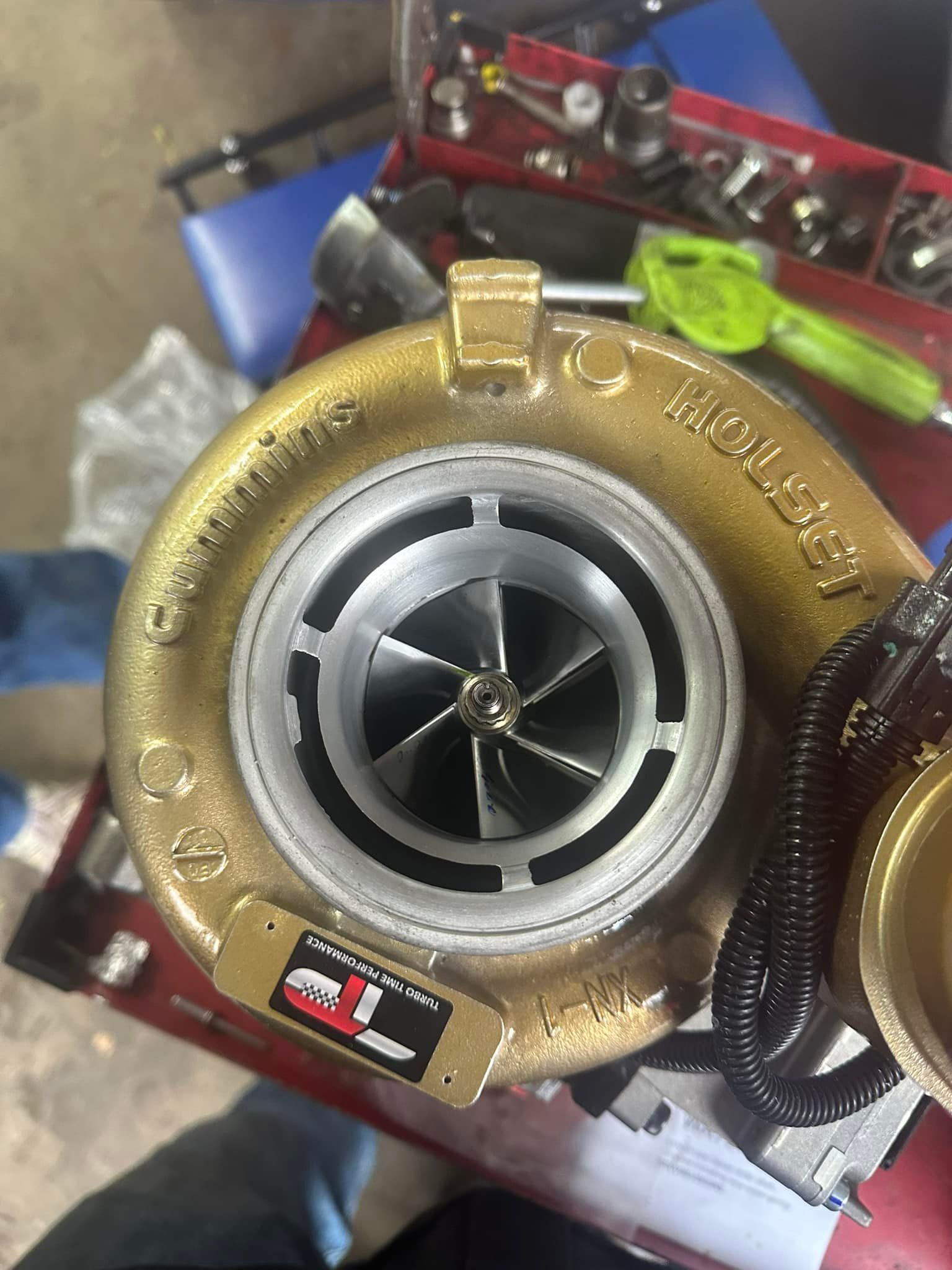 A turbocharger is sitting on top of a table.