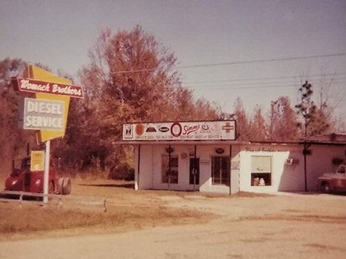 An old photo of a diesel service shop