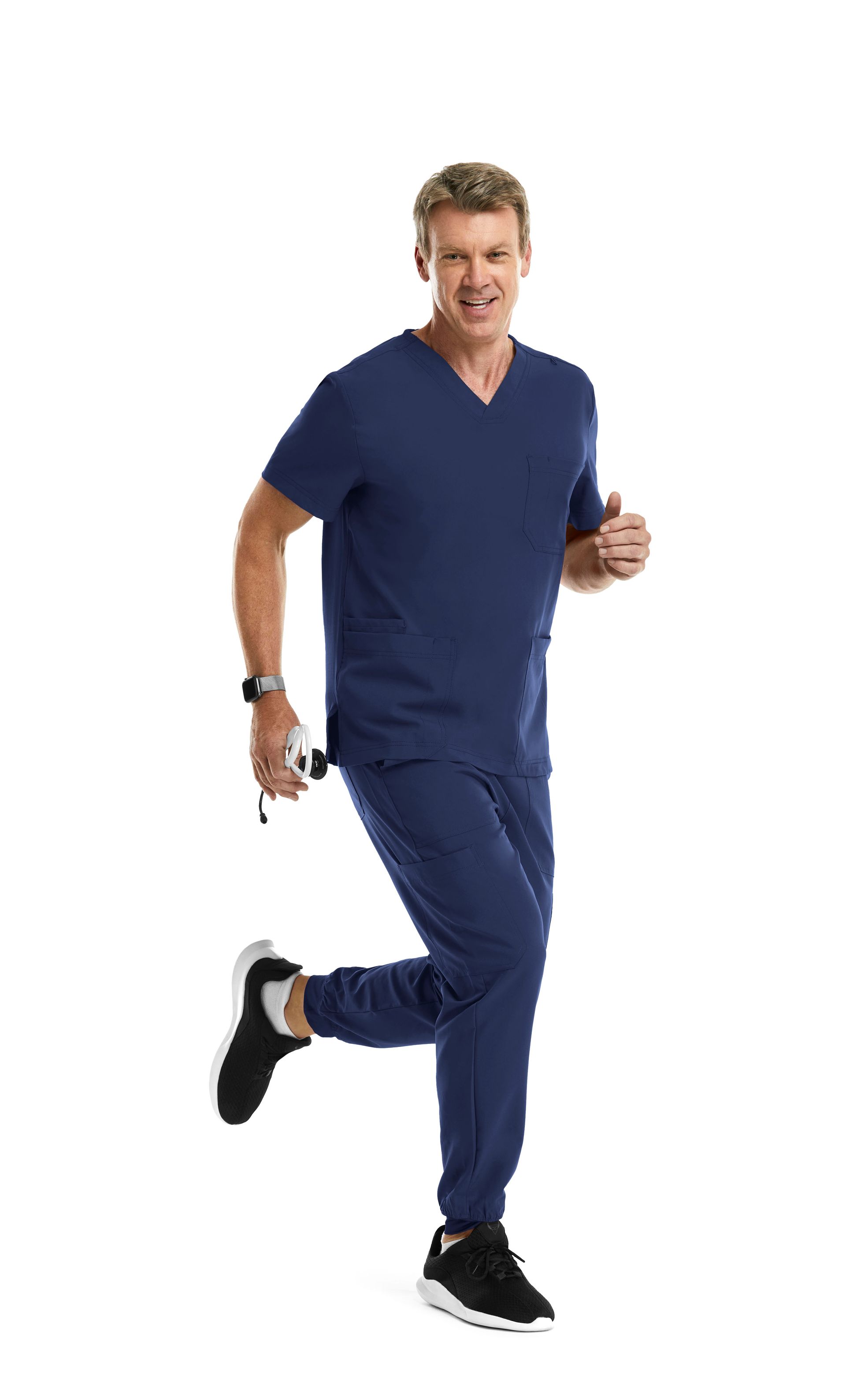 A man in a blue scrub suit is running on a white background.