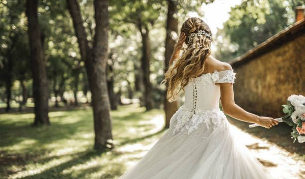 A Woman Wearing a Beautiful Bridal Gown — Greensboro, NC — Myline’s Bridal