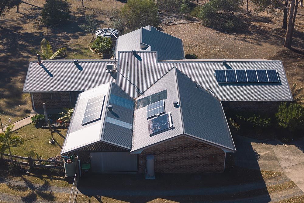 Metal Roofing With Solar Panels — Roofing in Bonny Hills, NSW