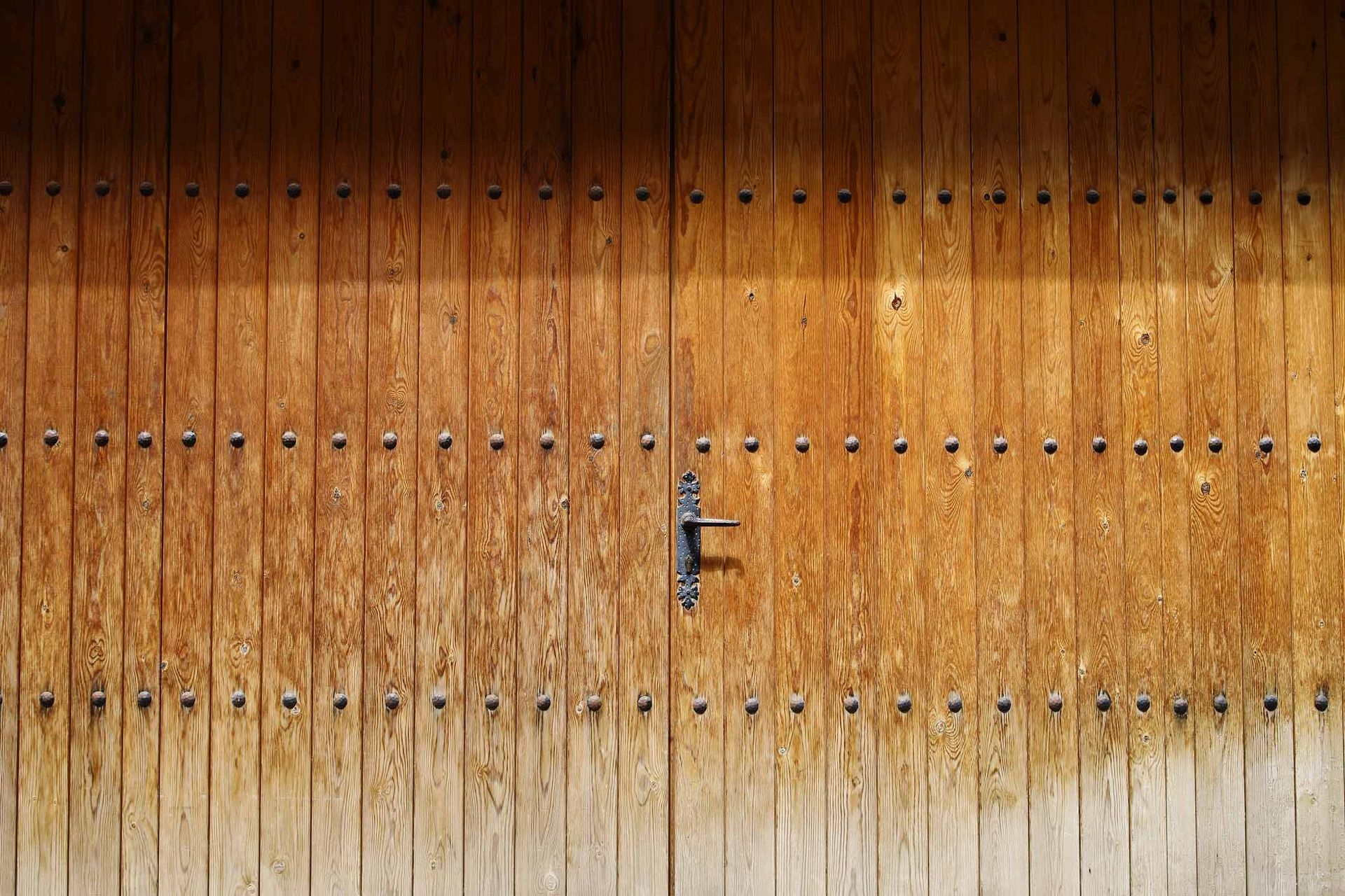 Wooden Door Gate With Metal Studs — Southwick, MA — Competitive Door