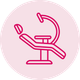 A line drawing of a dental chair in a pink circle